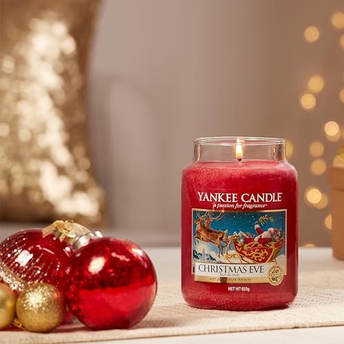51ILeBVsUdL._SL500_.jpg Yankee Candle Christmas Eve Scented Large Jar, 22oz Single Wick, 110+ Hours Burn Time - Image 7