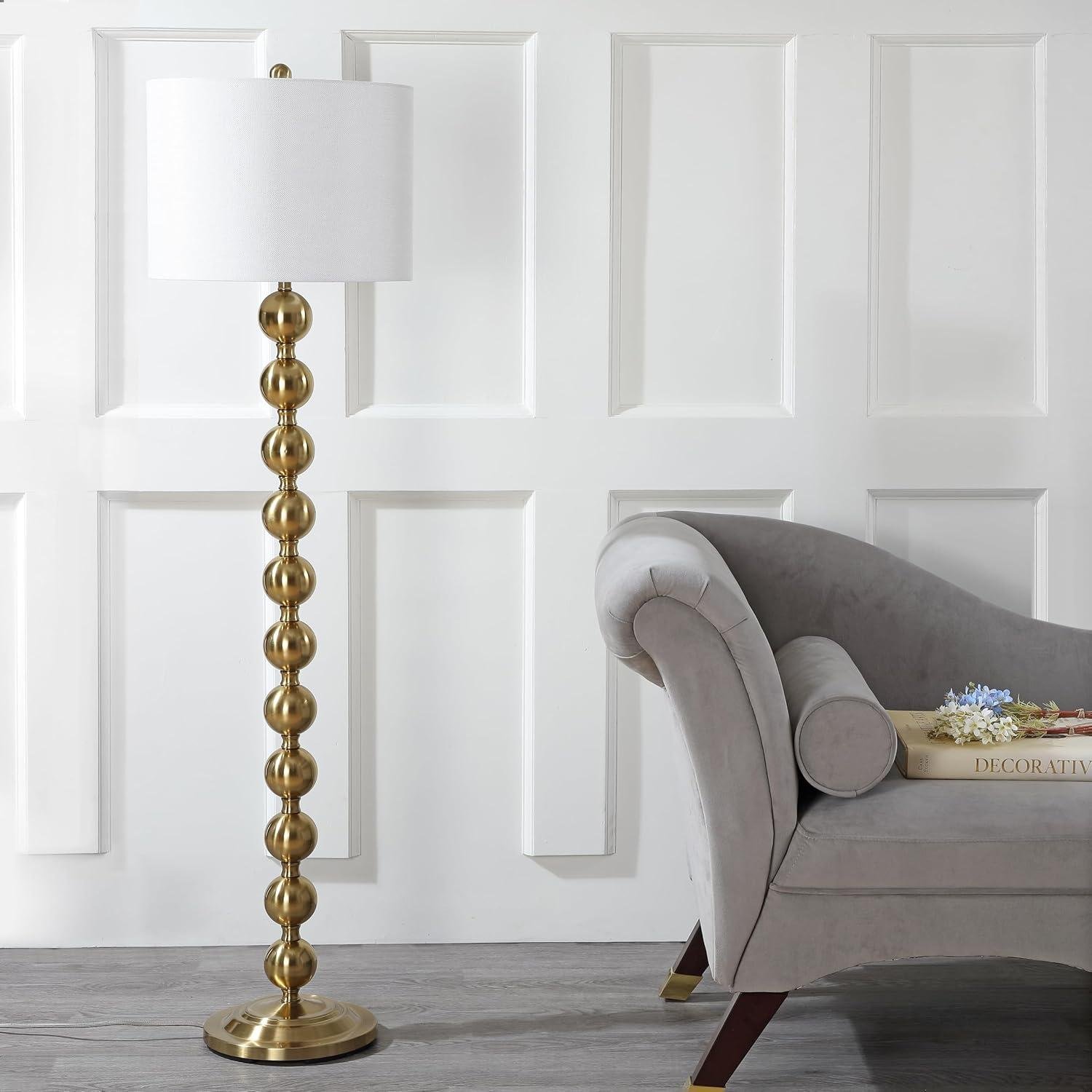 Our Review of the SAFAVIEH Reflections Brass Floor Lamp: Stylish & Bright