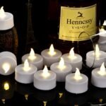 Hanzim 24-Pack Battery Operated LED Tea Lights: Realistic Flameless Votive Candles with 200-Hour Flicker for Holidays and Celebrations in Warm White. - Image 2